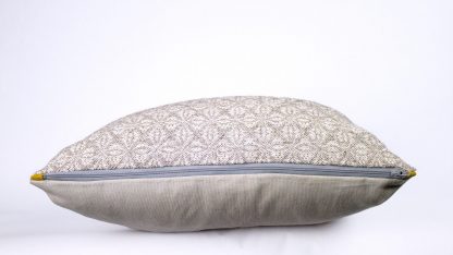 side view of handwoven pillow with zipper